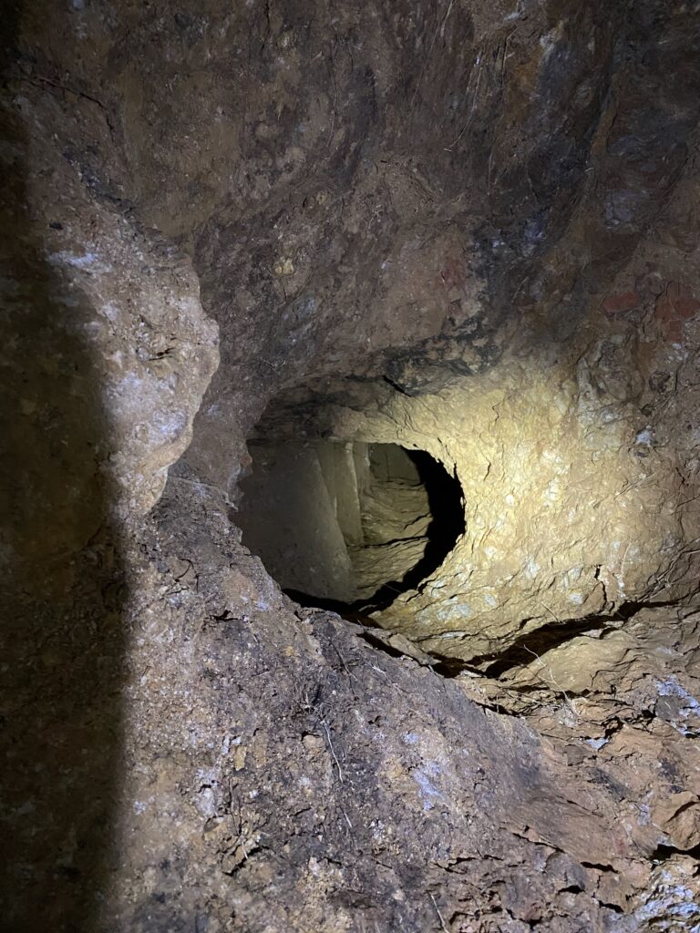 A small opening into the stone.